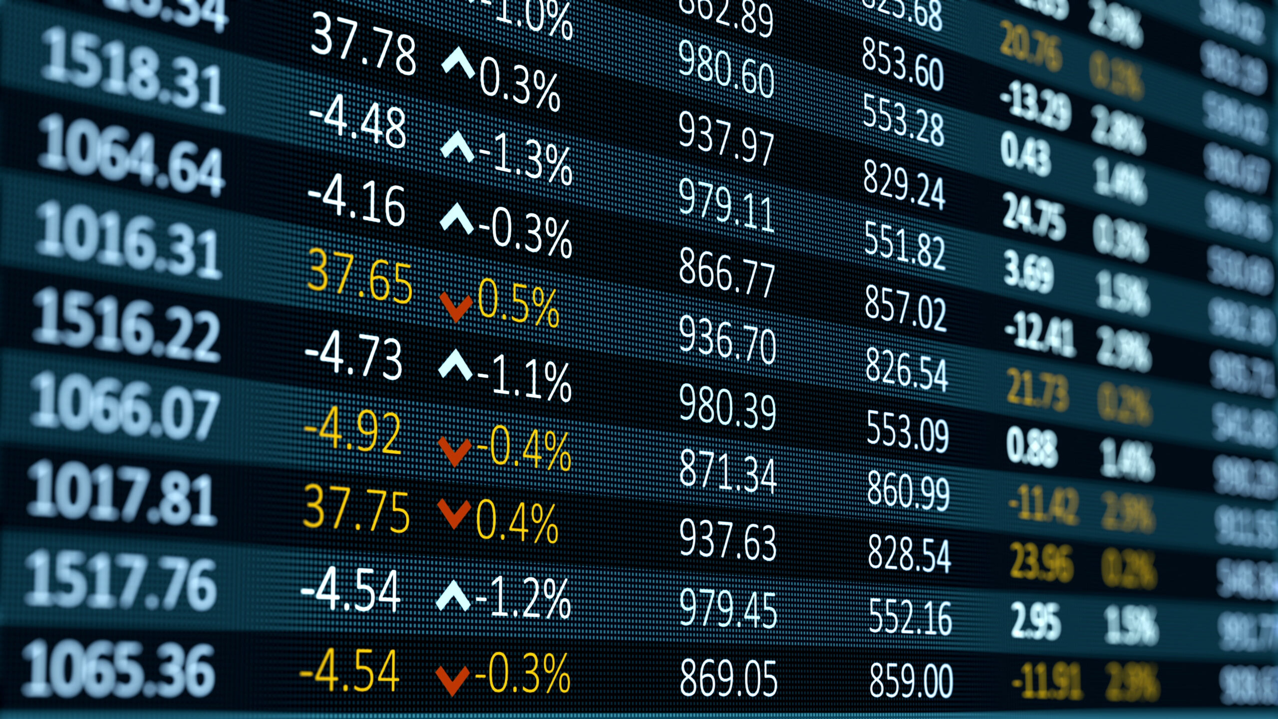 Digital stock market board displaying financial data, price changes, and market indicators